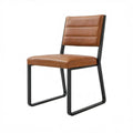 Eetkamerstoel met cognackleurige PU-bekleding en zwart stalen sledeframe, 45 x 55 x 86 cm