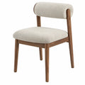 Crèmekleurige bouclé eetkamerstoel met walnootbruin rubberhouten frame, 50 x 54 x 78 cm